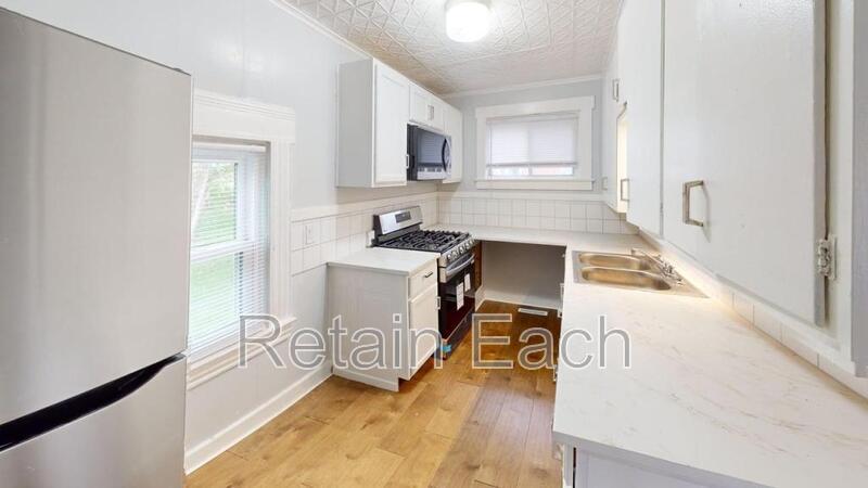 128 Huron St in Syracuse, NY - Building Photo