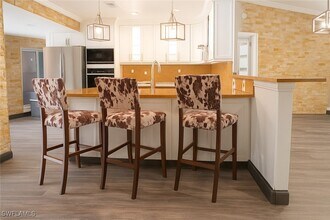 5556 32nd Ave SW in Naples, FL - Building Photo - Building Photo