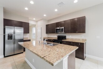 1183 NW Leonardo Cir in Port St. Lucie, FL - Foto de edificio - Building Photo