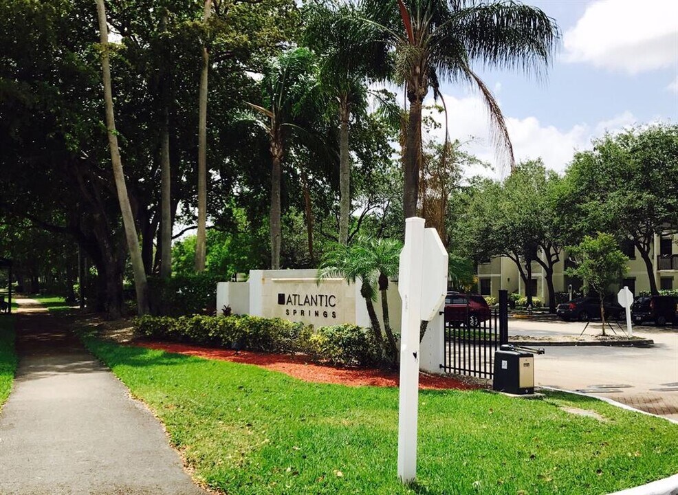 11295 W Atlantic Blvd, Unit 305 in Coral Springs, FL - Building Photo