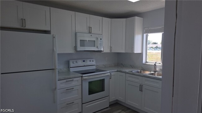1214 SE 8th Ave, Unit 4 in Cape Coral, FL - Building Photo - Building Photo