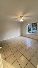 5470 16th Pl SW, Unit 111 in Naples, FL - Building Photo - Building Photo