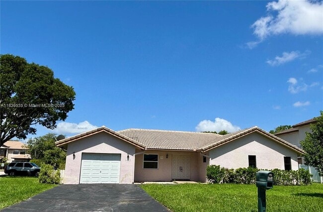 property at 11615 NW 23rd Ct
