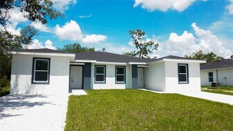 302 Bamboo Dr in Port Charlotte, FL - Building Photo
