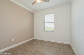 19121 Hinkley Dr in Estero, FL - Building Photo - Building Photo