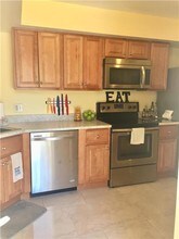 1705 Presidential Way-Unit -b101 in West Palm Beach, FL - Building Photo - Building Photo