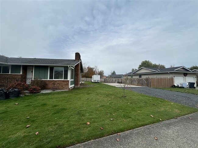 property at 209 E 3rd St