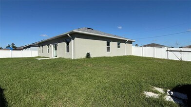 2129 Hibiscus Pl in Poinciana, FL - Building Photo - Building Photo