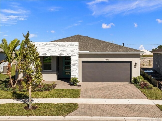 property at 14135 SW Safi Ter