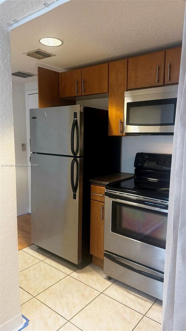 property at 7326 Collins Ave