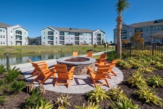 East Bay Flats Apartments in Parker, FL - Building Photo - Building Photo