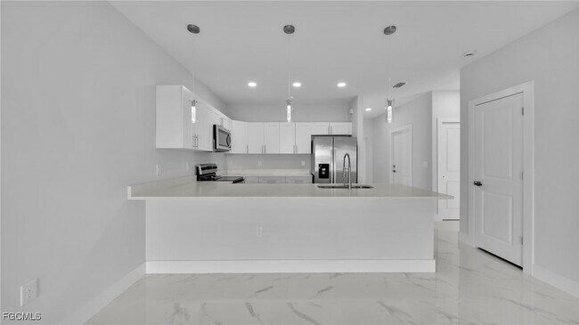 2405-2407 Xelda Ave N in Lehigh Acres, FL - Building Photo - Building Photo