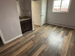 125 Charmony Frontage Rd, Unit 105 in Sterling, CO - Building Photo - Building Photo