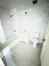 7302 Woodside Ave in Queens, NY - Building Photo - Building Photo