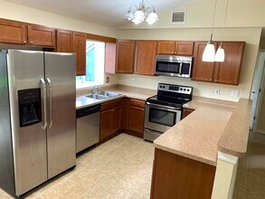 7055 Lassen Ave in New Port Richey, FL - Building Photo - Building Photo