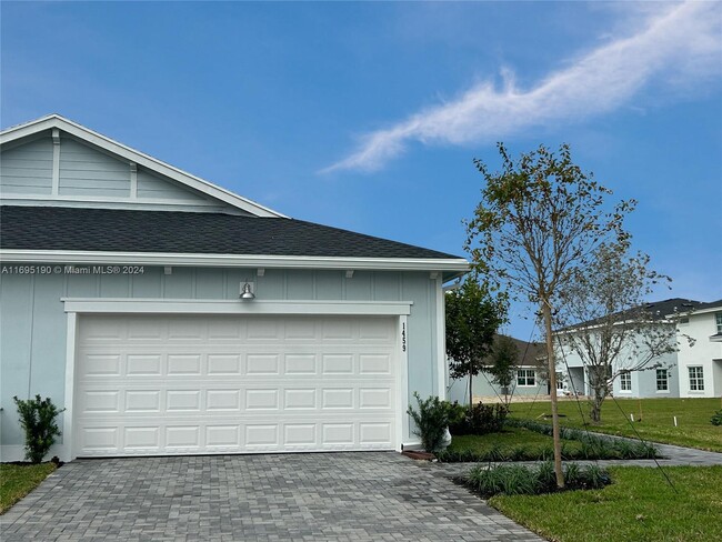 1459 Tangled Orchard Tr in Loxahatchee, FL - Foto de edificio - Building Photo