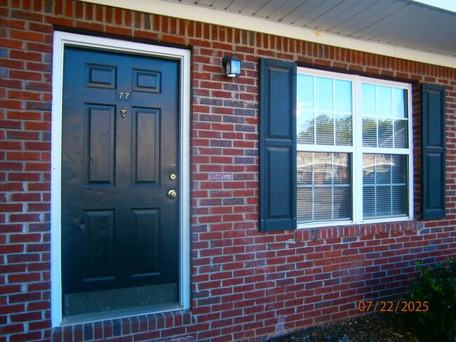 property at 77 Point Place Dr