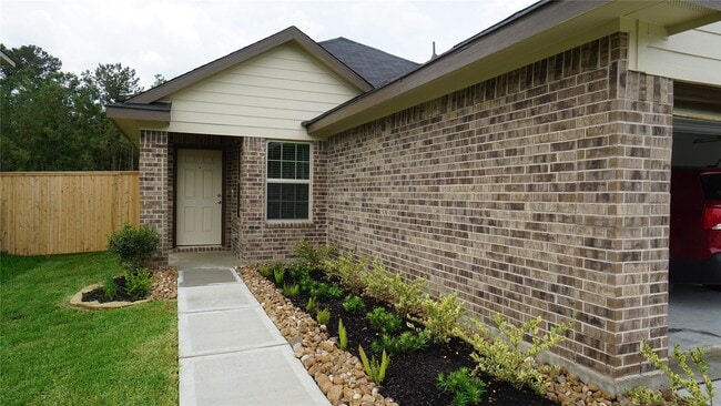 1117 Cedar Trace Pl in Pinehurst, TX - Building Photo - Building Photo