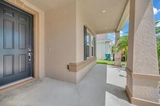 5335 NW Wisk Fern Cir in Port St. Lucie, FL - Building Photo - Building Photo
