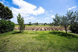 2730 NE Breezeway Cir in Ocean Breeze, FL - Building Photo - Building Photo