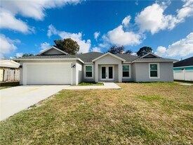 928 SW John MacCormack Terrace in Port St. Lucie, FL - Building Photo