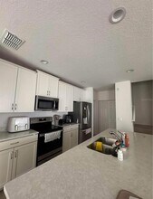 1272 Wispy Cypress Dr in Kissimmee, FL - Building Photo - Building Photo