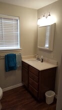 1015 N Houston St, Unit #106 in Livingston, TX - Foto de edificio - Building Photo