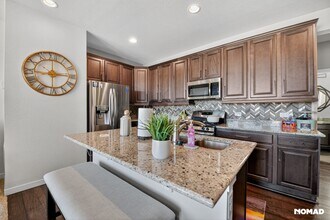 15609 E Broncos Pl in Englewood, CO - Building Photo - Building Photo