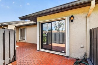 704 Sunny Pine Way in Greenacres, FL - Building Photo - Building Photo