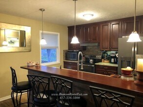 1791 Fruit Farm Rd in Hollister, MO - Building Photo - Building Photo
