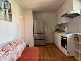 25 Tollerton Ave in Toronto, ON - Building Photo