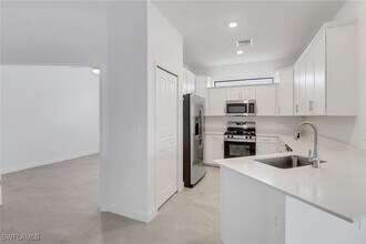19541 Hinkley Dr in Estero, FL - Building Photo - Building Photo
