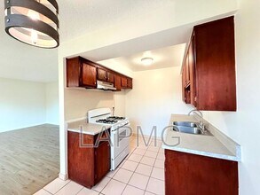 7039-7039 Miles Ave in Huntington Park, CA - Building Photo - Building Photo