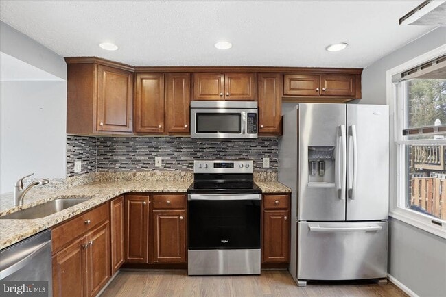 8418 White Feather Ct in Lorton, VA - Building Photo - Building Photo