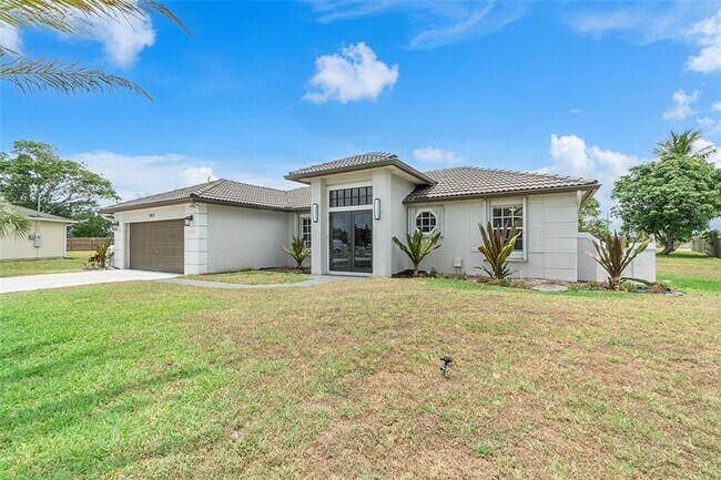 1383 SE Appamattox Terrace in Port St. Lucie, FL - Building Photo - Building Photo