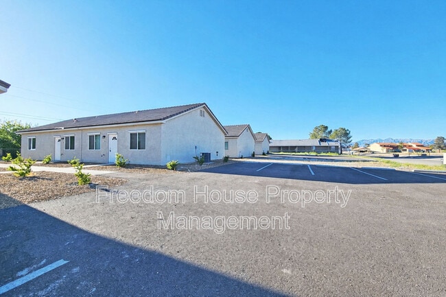 1111 Sixshooter Ave in Pahrump, NV - Building Photo - Building Photo