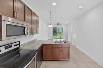 8815 NW 76th Dr in Tamarac, FL - Building Photo - Building Photo