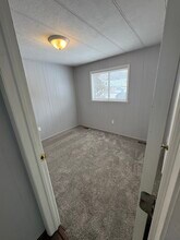 407 Mill St, Unit 407 Mill street in East Jordan, MI - Foto de edificio - Building Photo