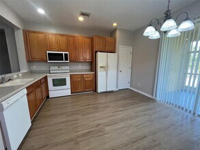 13282 SW Pembroke Cir N in Lake Suzy, FL - Building Photo - Building Photo