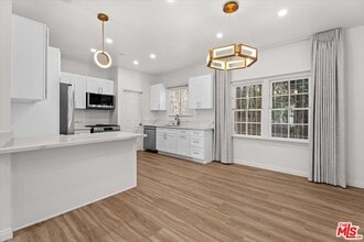 9687 W Olympic Blvd in Beverly Hills, CA - Building Photo - Building Photo