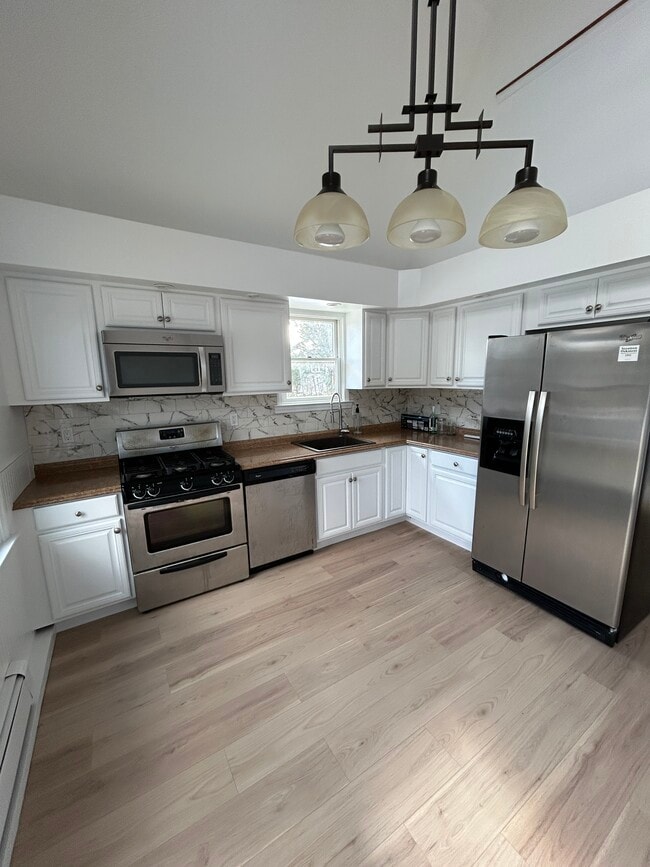 61 Nelson Ave, Unit Nelson 2br Loft in Blue Point, NY - Foto de edificio - Building Photo