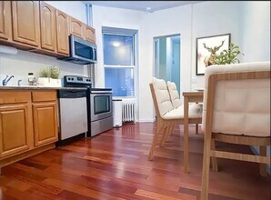 129 W 56th St in New York, NY - Building Photo - Building Photo
