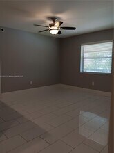 6040 Shaker Wood Cir in Tamarac, FL - Building Photo - Building Photo