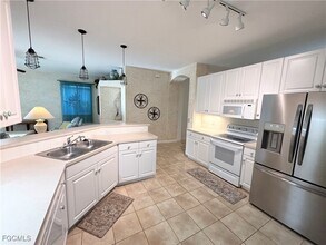 14255 Reflection Lakes Dr in Ft. Myers, FL - Foto de edificio - Building Photo