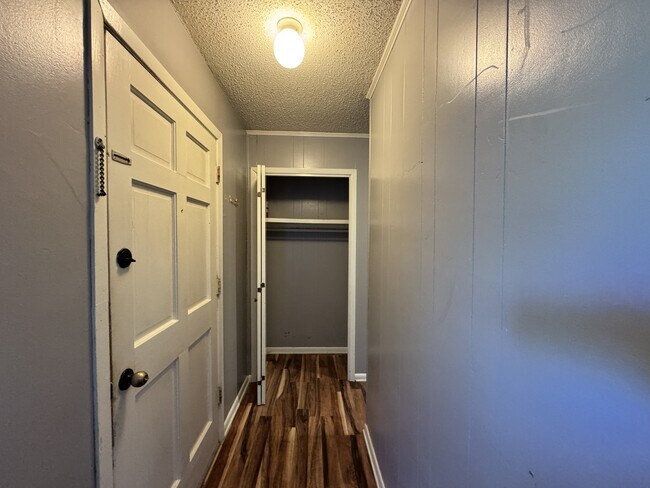 property at 203 E John Sims Pkwy