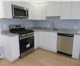 27 Burtt St in Lowell, MA - Building Photo - Building Photo