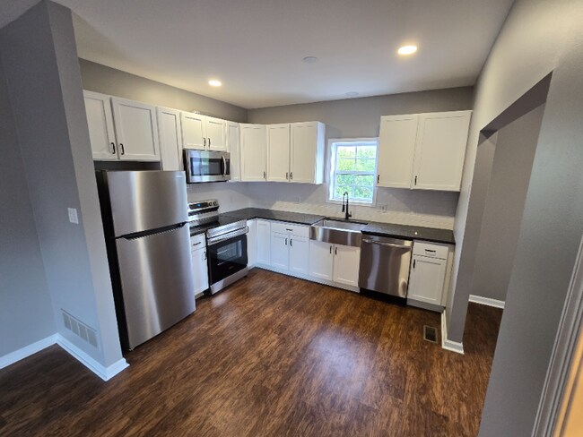 property at 26 E 8th St