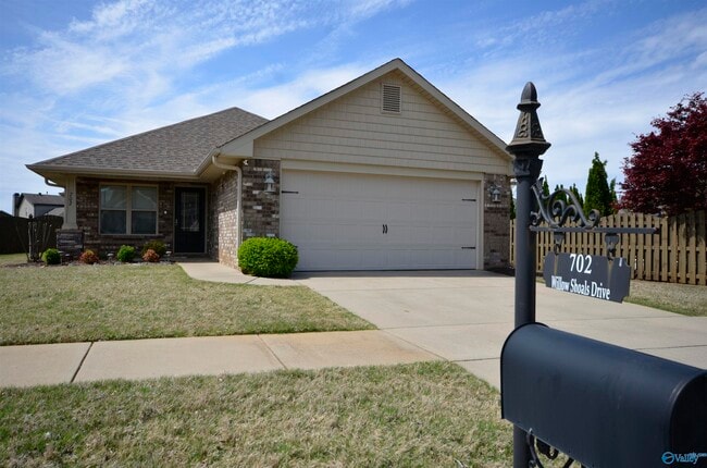 property at 702 Willow Shoals Dr SW