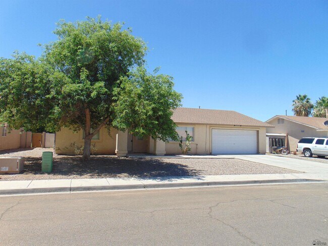 property at 11377 E 26th St
