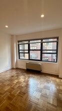 140 E 56th St, Unit 12M in New York, NY - Building Photo - Building Photo